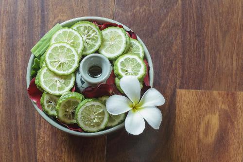 Kaffir limes in a bowl of water
